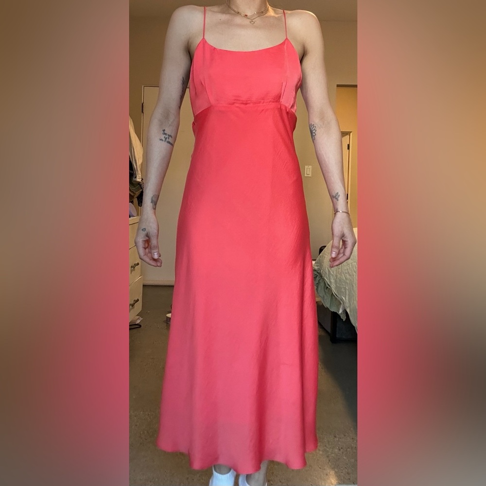Beautiful brand new coral silk like material, flows and is soft